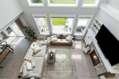 Stunning home in the highly sought-after Macatawa Legends on The Macatwa Legends Golf Course in Michigan - for sale on GolfHomes.com, golf home, golf lot