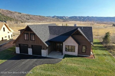 This home perfectly blends luxury with practicality. It offers a on Teton Reserve in Idaho - for sale on GolfHomes.com, golf home, golf lot