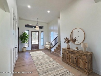 This home perfectly blends luxury with practicality. It offers a on Teton Reserve in Idaho - for sale on GolfHomes.com, golf home, golf lot