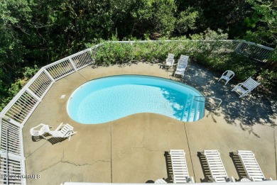 A new fortified (2025) roof and new top floor outdoor decking on The Currituck Golf Club in North Carolina - for sale on GolfHomes.com, golf home, golf lot