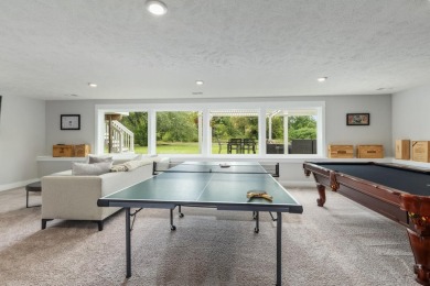 Stunning home in the highly sought-after Macatawa Legends on The Macatwa Legends Golf Course in Michigan - for sale on GolfHomes.com, golf home, golf lot