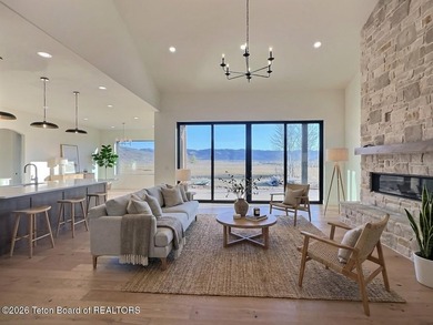 This home perfectly blends luxury with practicality. It offers a on Teton Reserve in Idaho - for sale on GolfHomes.com, golf home, golf lot