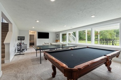 Stunning home in the highly sought-after Macatawa Legends on The Macatwa Legends Golf Course in Michigan - for sale on GolfHomes.com, golf home, golf lot