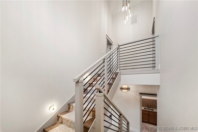 Experience luxury in this stunning 5,500 sq ft home that blends on The Club At Porto Cima in Missouri - for sale on GolfHomes.com, golf home, golf lot