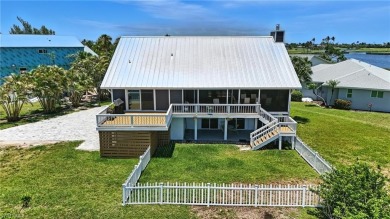 Welcome to this newly renovated luxury lakeside retreat on The Dunes Golf and Tennis Club in Florida - for sale on GolfHomes.com, golf home, golf lot