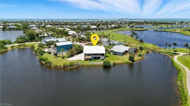 Welcome to this newly renovated luxury lakeside retreat on The Dunes Golf and Tennis Club in Florida - for sale on GolfHomes.com, golf home, golf lot