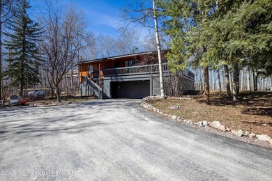 Remodeled from top to bottom. Kitchen is spacious and bright on Star Valley RV Golf Course in Wyoming - for sale on GolfHomes.com, golf home, golf lot