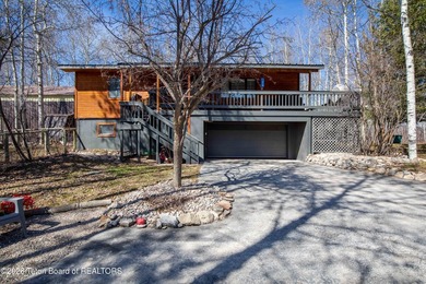 Remodeled from top to bottom. Kitchen is spacious and bright on Star Valley RV Golf Course in Wyoming - for sale on GolfHomes.com, golf home, golf lot