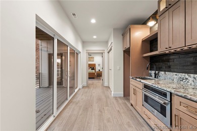 Experience luxury in this stunning 5,500 sq ft home that blends on The Club At Porto Cima in Missouri - for sale on GolfHomes.com, golf home, golf lot