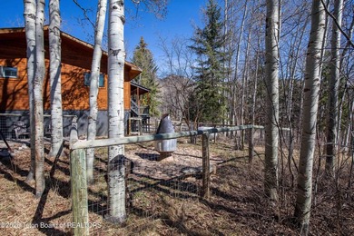 Remodeled from top to bottom. Kitchen is spacious and bright on Star Valley RV Golf Course in Wyoming - for sale on GolfHomes.com, golf home, golf lot