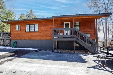 Remodeled from top to bottom. Kitchen is spacious and bright on Star Valley RV Golf Course in Wyoming - for sale on GolfHomes.com, golf home, golf lot