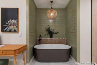 Experience luxury in this stunning 5,500 sq ft home that blends on The Club At Porto Cima in Missouri - for sale on GolfHomes.com, golf home, golf lot