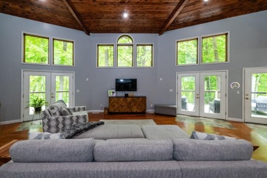 Nestled in a quiet cul-de-sac, this beautifully updated on Point O Woods Country Club in Michigan - for sale on GolfHomes.com, golf home, golf lot
