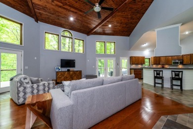 Nestled in a quiet cul-de-sac, this beautifully updated on Point O Woods Country Club in Michigan - for sale on GolfHomes.com, golf home, golf lot