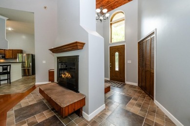 Nestled in a quiet cul-de-sac, this beautifully updated on Point O Woods Country Club in Michigan - for sale on GolfHomes.com, golf home, golf lot