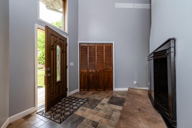 Nestled in a quiet cul-de-sac, this beautifully updated on Point O Woods Country Club in Michigan - for sale on GolfHomes.com, golf home, golf lot