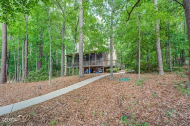 Jackson Lake Home with Custom Dock, beach and new roof on 1.5acre on Turtle Cove Golf Course in Georgia - for sale on GolfHomes.com, golf home, golf lot