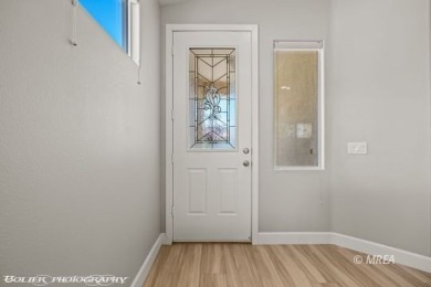 Tucked just off the fairway, this inviting 2-bedroom home offers on The Oasis Golf Club in Nevada - for sale on GolfHomes.com, golf home, golf lot