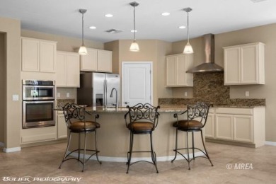 This delightful single-level 2-bedroom, 2-bathroom home is on Conestoga Golf Club in Nevada - for sale on GolfHomes.com, golf home, golf lot