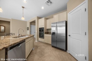 This delightful single-level 2-bedroom, 2-bathroom home is on Conestoga Golf Club in Nevada - for sale on GolfHomes.com, golf home, golf lot