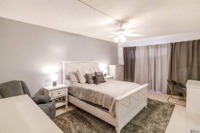 Spacious 2-story, 2 bed, 3 bath home just steps from a Yuma golf on Yuma Golf and Country Club in Arizona - for sale on GolfHomes.com, golf home, golf lot