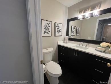 Gorgeous and spectacularly updated Oak Pointe condo with access on Oak Pointe Country Club in Michigan - for sale on GolfHomes.com, golf home, golf lot