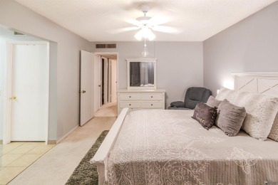 Spacious 2-story, 2 bed, 3 bath home just steps from a Yuma golf on Yuma Golf and Country Club in Arizona - for sale on GolfHomes.com, golf home, golf lot