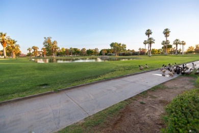 Spacious 2-story, 2 bed, 3 bath home just steps from a Yuma golf on Yuma Golf and Country Club in Arizona - for sale on GolfHomes.com, golf home, golf lot