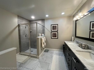 Gorgeous and spectacularly updated Oak Pointe condo with access on Oak Pointe Country Club in Michigan - for sale on GolfHomes.com, golf home, golf lot