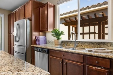 Stunning 2-bedroom + den home located on the 5th hole of the on The Oasis Golf Club in Nevada - for sale on GolfHomes.com, golf home, golf lot