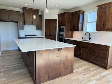 BEAUTIFUL MODEL NOW FOR SALE! WELCOME TO THE SORRENTO -REV 1 on Falcon Ridge Golf Course in Kansas - for sale on GolfHomes.com, golf home, golf lot