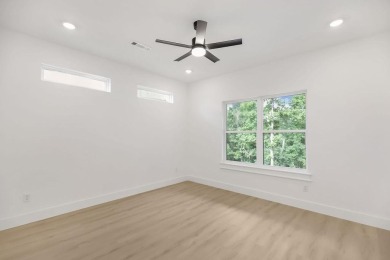 Discover modern living at its finest at 85 Rountree, located on Bella Vista Country Club - Berksdale in Arkansas - for sale on GolfHomes.com, golf home, golf lot