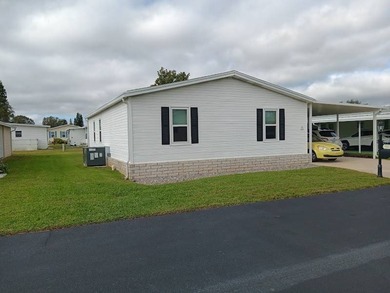 Welcome to this well-maintained 2 Bedroom/2 Bath home on a quiet on Four Lakes Golf Club in Florida - for sale on GolfHomes.com, golf home, golf lot