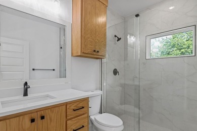 Discover modern living at its finest at 85 Rountree, located on Bella Vista Country Club - Berksdale in Arkansas - for sale on GolfHomes.com, golf home, golf lot