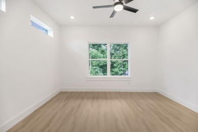 Discover modern living at its finest at 85 Rountree, located on Bella Vista Country Club - Berksdale in Arkansas - for sale on GolfHomes.com, golf home, golf lot