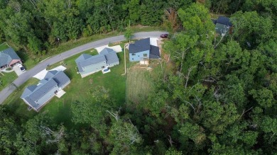 Discover modern living at its finest at 85 Rountree, located on Bella Vista Country Club - Berksdale in Arkansas - for sale on GolfHomes.com, golf home, golf lot