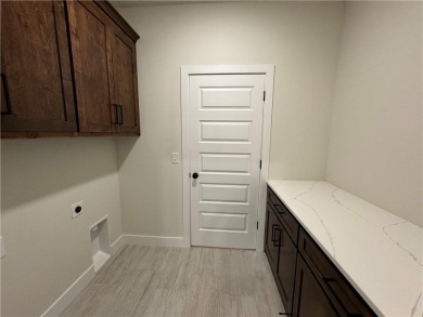 BEAUTIFUL MODEL NOW FOR SALE! WELCOME TO THE SORRENTO -REV 1 on Falcon Ridge Golf Course in Kansas - for sale on GolfHomes.com, golf home, golf lot