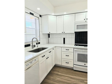 Welcome to this beautifully renovated 2-bedroom, 2-bathroom on Inverrary Country Club in Florida - for sale on GolfHomes.com, golf home, golf lot