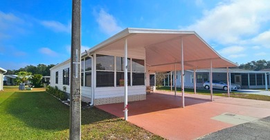 Spacious 2 bedroom 2 bath home in 55 + Resort style community in on Zephyrhills Municipal Golf Course in Florida - for sale on GolfHomes.com, golf home, golf lot