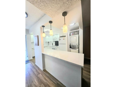 Welcome to this beautifully renovated 2-bedroom, 2-bathroom on Inverrary Country Club in Florida - for sale on GolfHomes.com, golf home, golf lot