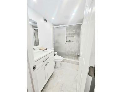 Welcome to this beautifully renovated 2-bedroom, 2-bathroom on Inverrary Country Club in Florida - for sale on GolfHomes.com, golf home, golf lot