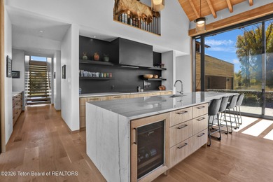 Perfectly positioned on one of the most breathtaking vantage on Jackson Hole Golf and Tennis Club in Wyoming - for sale on GolfHomes.com, golf home, golf lot