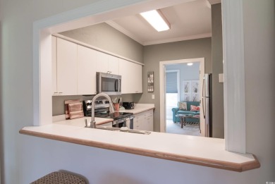 Second story end unit with sweeping views of Pawleys Plantation on  in South Carolina - for sale on GolfHomes.com, golf home, golf lot