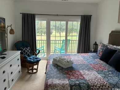 Second story end unit with sweeping views of Pawleys Plantation on  in South Carolina - for sale on GolfHomes.com, golf home, golf lot