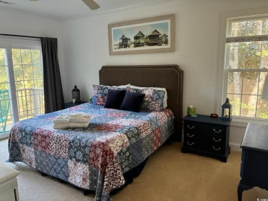 Second story end unit with sweeping views of Pawleys Plantation on  in South Carolina - for sale on GolfHomes.com, golf home, golf lot