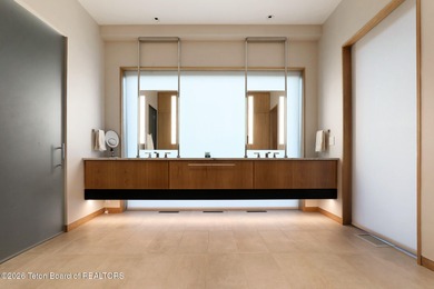 Perfectly positioned on one of the most breathtaking vantage on Jackson Hole Golf and Tennis Club in Wyoming - for sale on GolfHomes.com, golf home, golf lot