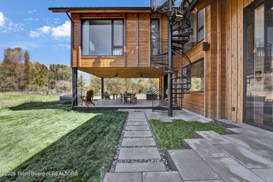 Perfectly positioned on one of the most breathtaking vantage on Jackson Hole Golf and Tennis Club in Wyoming - for sale on GolfHomes.com, golf home, golf lot