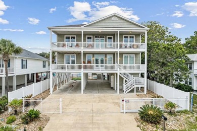 Discover coastal elegance in this stunning 6 bed, 5.5 bath beach on Beachwood Golf Club in South Carolina - for sale on GolfHomes.com, golf home, golf lot