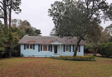 Location Location Location, 5720 Springs Ave is a centrally on Whispering Pines in South Carolina - for sale on GolfHomes.com, golf home, golf lot