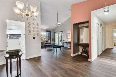 Welcome to this beautifully updated 2-bedroom + office/3rd on Caloosa Greens Executive Golf Course in Florida - for sale on GolfHomes.com, golf home, golf lot